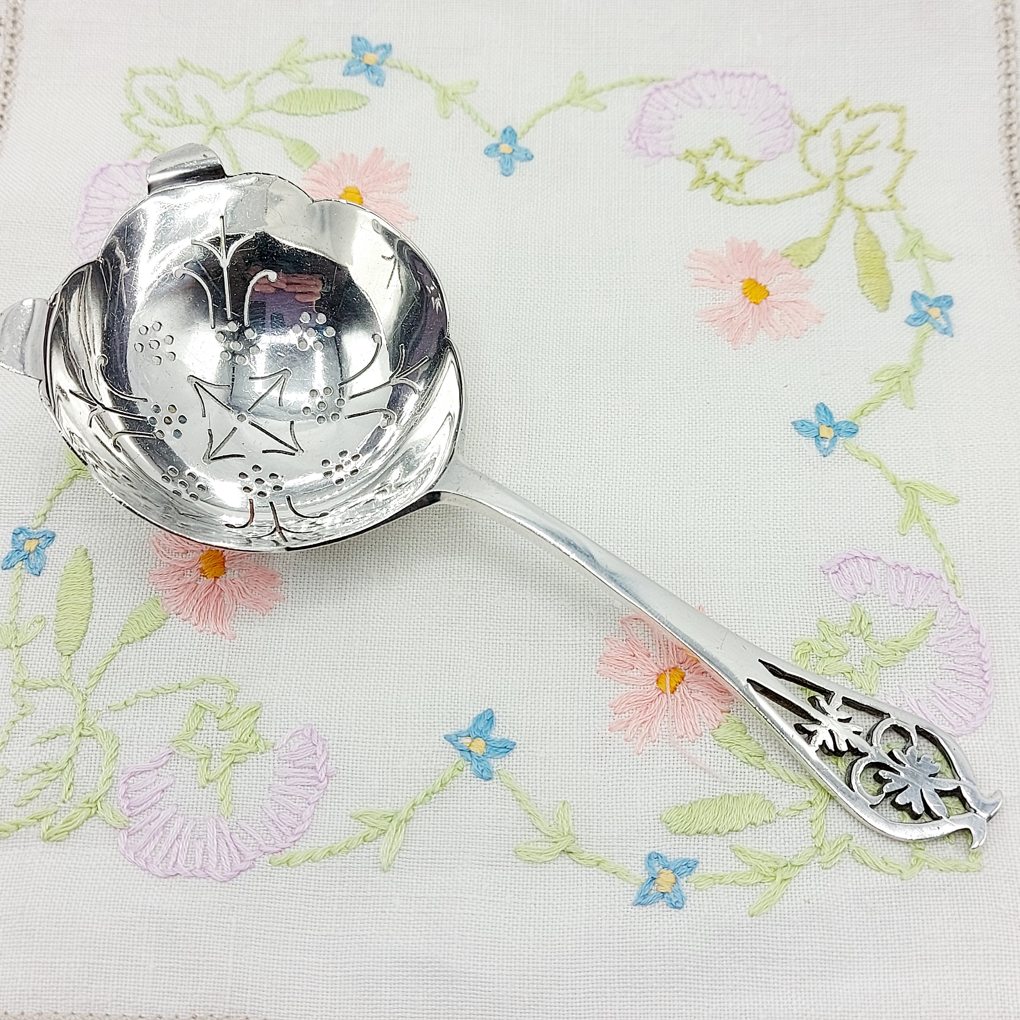 Elegant Pierced Silver Tea Strainer