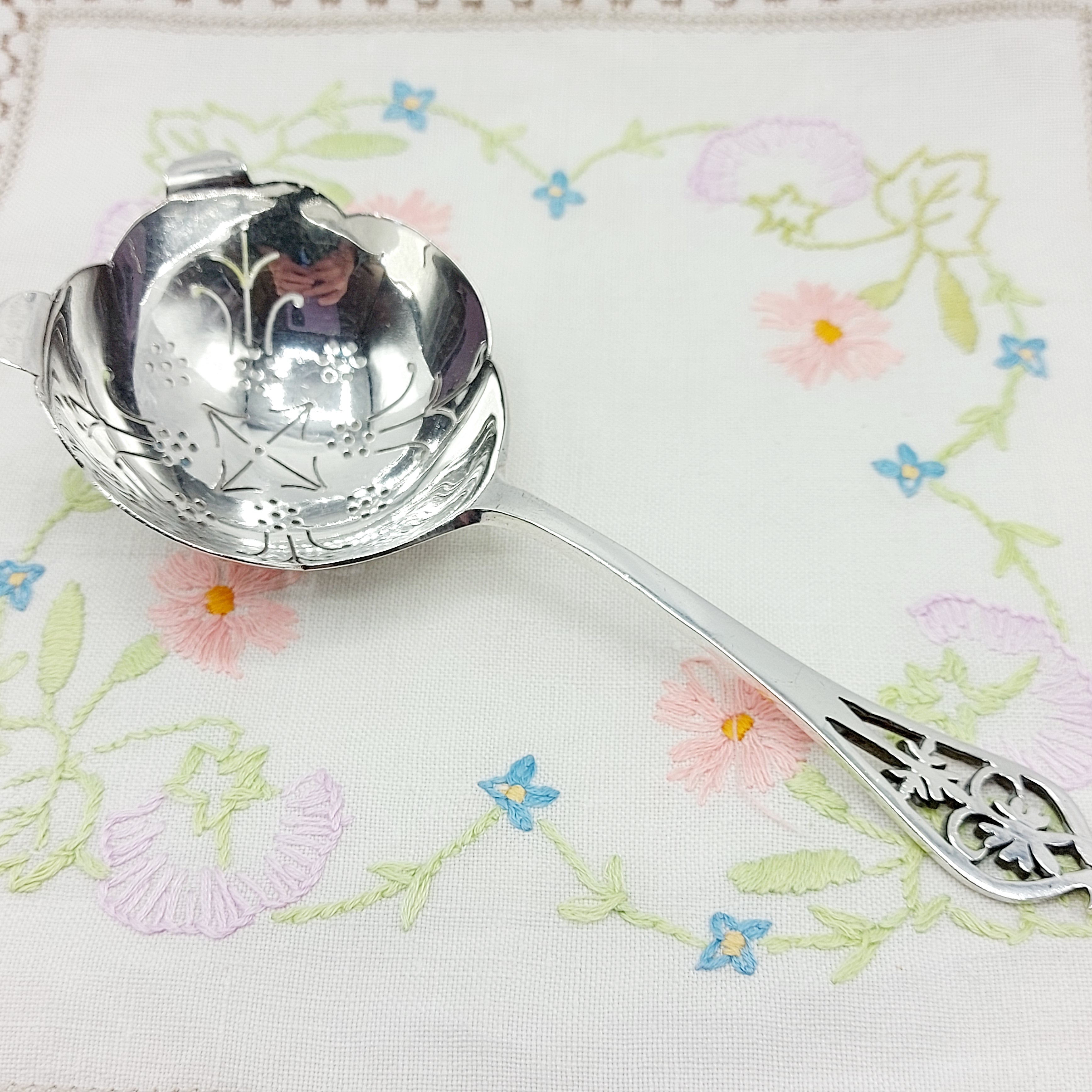 Elegant Pierced Silver Tea Strainer