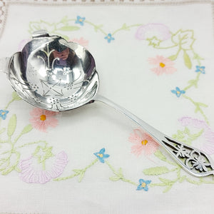 Elegant Pierced Silver Tea Strainer